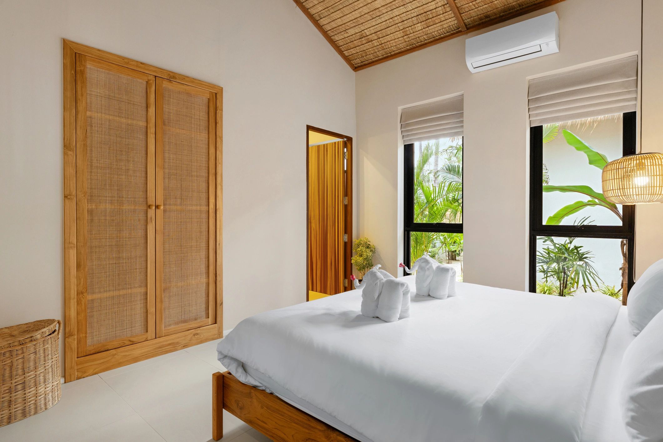 Spacious vacation rental bedroom with clean modern styling