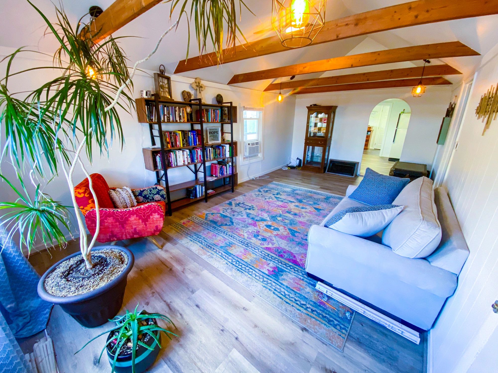Warm vacation rental living room with rustic character